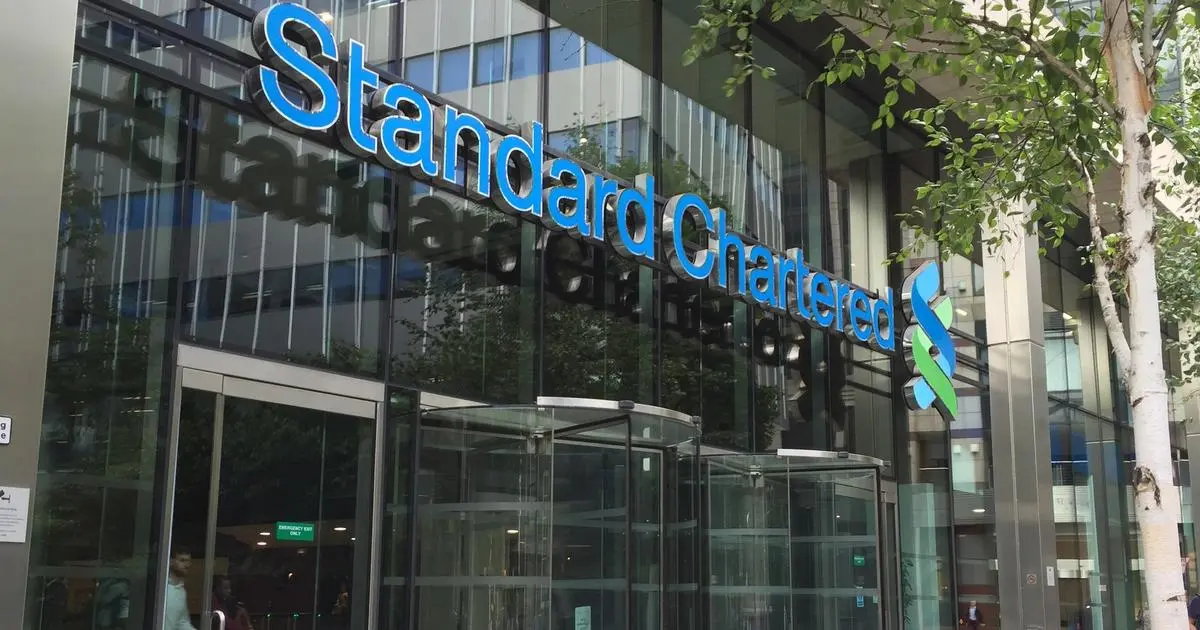 StanChart Aims to Cut $1 Billion in Costs, Starting with 100 Layoffs